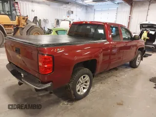 2018 Chevrolet Silverado 1500 LT with VIN 1GCVKREC3JZ190574, listed as a IAAI auction lot 41897346 with 144,927 mi miles and . Bid and sale history available at DreamBid. Image 4.