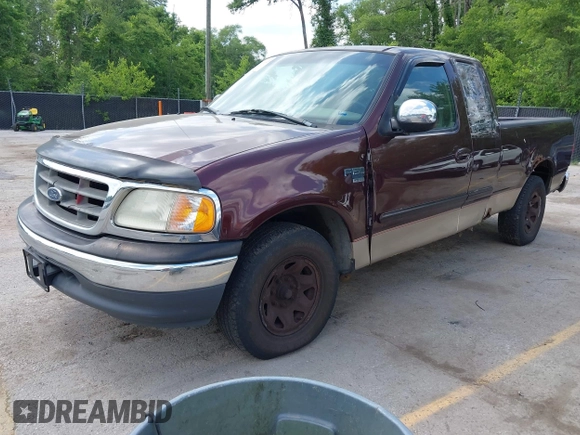 2000 Ford F-150 z VIN 1FTPX17LXYNA52377, wystawiony jako IAAI lot #42265332 z przebiegiem 220 971 mil mil oraz . Historia ofert i sprzedaży dostępna na DreamBid. Obrazek 2.