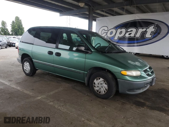 1999 Dodge Caravan with VIN 2B4GP25R8XR200747, listed as a Copart auction lot 58273225 with 182,147 mi miles and Salvage title. Bid and sale history available at DreamBid. Image 4.