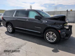 2023 GMC Yukon XL SLT z VIN 1GKS2GKD3PR282110, wystawiony jako Copart lot #52950425 z przebiegiem 99 147 mil mil oraz Szkoda całkowita • Salvage title. Historia ofert i sprzedaży dostępna na DreamBid. Obrazek 4.
