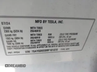 2024 Tesla Model Y Long Range with VIN 7SAYGDEE8RF161370, listed as a IAAI auction lot 41692706 with 11,490 mi miles. Bid and sale history available at carsss.com. Image 9.