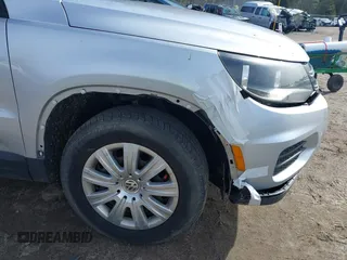 2012 Volkswagen Tiguan with VIN WVGCV7AX6CW589605, listed as a IAAI auction lot 41916090 with 123,223 mi miles and . Bid and sale history available at DreamBid. Image 12.