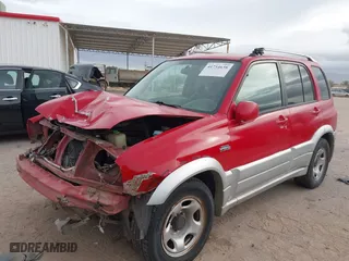 2004 Suzuki Grand Vitara with VIN JS3TE62V344100216, listed as a IAAI auction lot 41734638 with 213,166 mi miles. Bid and sale history available at carsss.com. Image 6.