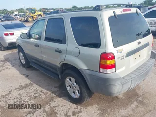2005 Ford Escape XLT with VIN 1FMYU03145KA40360, listed as a IAAI auction lot 42511276 with 151,269 mi miles and . Bid and sale history available at DreamBid. Image 3.