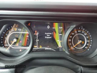 2024 Jeep Gladiator Rubicon z VIN 1C6JJTBG7RL105165, wystawiony jako Copart lot #57459125 z przebiegiem 2 092 mil mil oraz Szkoda całkowita • Salvage title. Historia ofert i sprzedaży dostępna na DreamBid. Obrazek 9.