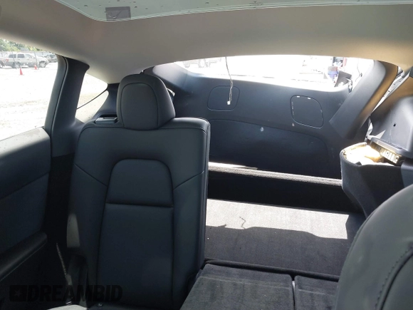 2023 Tesla Model Y Long Range z VIN 7SAYGDEE9PF753051, wystawiony jako IAAI lot #39615839 z przebiegiem Nie podano mil oraz . Historia ofert i sprzedaży dostępna na DreamBid. Obrazek 8.