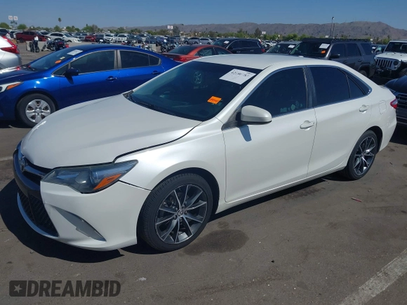 2015 Toyota Camry XLE with VIN 4T1BF1FK9FU052360, listed as a IAAI auction lot 42180783 with 119,079 mi miles and . Bid and sale history available at DreamBid. Image 2.