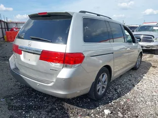2009 Honda Odyssey Touring z VIN 5FNRL38999B052244, wystawiony jako IAAI lot #42085003 z przebiegiem 269 402 mil mil oraz . Historia ofert i sprzedaży dostępna na DreamBid. Obrazek 4.