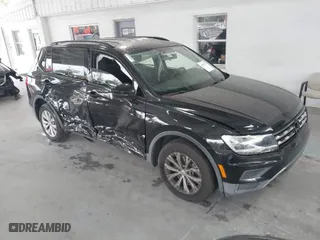 2019 Volkswagen Tiguan S with VIN 3VV1B7AX1KM073074, listed as a IAAI auction lot 41387775 with 57,045 mi miles. Bid and sale history available at carsss.com. Image 1.