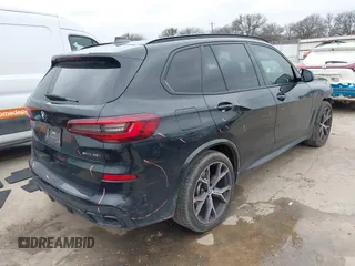 2022 BMW X5 sDrive40i with VIN 5UXCR4C07N9M28669, listed as a IAAI auction lot 41543581 with 59,497 mi miles. Bid and sale history available at carsss.com. Image 4.