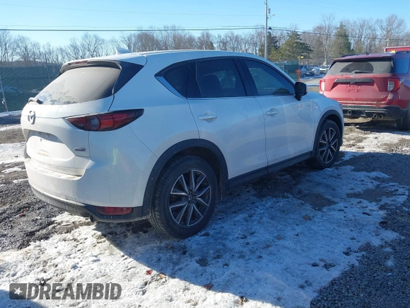 2017 Mazda CX-5 Grand Touring with VIN JM3KFBDL2H0171021, listed as a IAAI auction lot 41619642 with 67,581 mi miles. Bid and sale history available at carsss.com. Image 4.