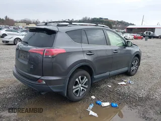 2018 Toyota RAV4 LE with VIN JTMBFREV2JJ727457, listed as a IAAI auction lot 41758208 with 65,740 mi miles. Bid and sale history available at carsss.com. Image 4.
