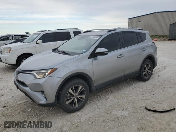 2018 Toyota RAV4 XLE with VIN JTMWFREV3JJ180152, listed as a Copart auction lot 46949465 with 103,346 mi miles and Clean Title. Bid and sale history available at DreamBid. Image 1.