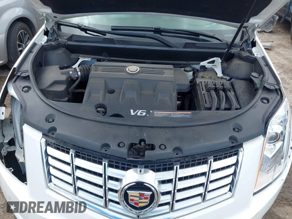 2015 Cadillac SRX Premium Collection with VIN 3GYFNDE37FS627697, listed as a IAAI auction lot 42354811 with 64,135 mi miles and . Bid and sale history available at DreamBid. Image 10.