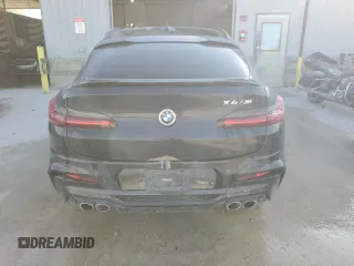 2021 BMW X4 M z VIN 5YMUJ0C07M9D97521, wystawiony jako Copart lot #53320104 z przebiegiem 81 670 mil mil oraz Szkoda całkowita • Salvage title. Historia ofert i sprzedaży dostępna na DreamBid. Obrazek 6.