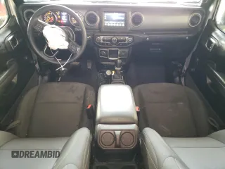 2023 Jeep Wrangler Sport S with VIN 1C4HJXDG0PW670641, listed as a Copart auction lot 41623195 with 27,266 mi miles and Salvage Title. Bid and sale history available at DreamBid. Image 8.