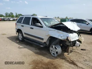 2005 Jeep Grand Cherokee Laredo z VIN 1J4GR48KX5C581833, wystawiony jako Copart lot #60975355 z przebiegiem 149 993 mil mil oraz Szkoda całkowita • Salvage title. Historia ofert i sprzedaży dostępna na DreamBid. Obrazek 4.