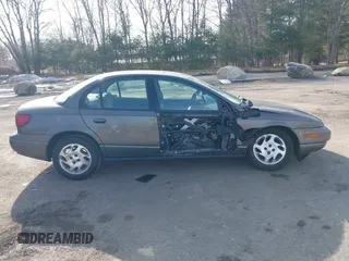 2000 Saturn SL z VIN 1G8ZK5275YZ244530, wystawiony jako IAAI lot #41784896 z przebiegiem 50 332 mil mil oraz . Historia ofert i sprzedaży dostępna na DreamBid. Obrazek 14.