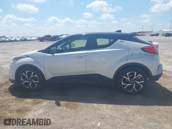 2019 Toyota C-HR XLE z VIN JTNKHMBX8K1061351, wystawiony jako IAAI lot #42053354 z przebiegiem 76 000 mil mil oraz . Historia ofert i sprzedaży dostępna na DreamBid. Obrazek 14.