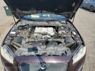 2012 Jaguar XJ Supersport z VIN SAJWA2JC4CMV21796, wystawiony jako Copart lot #66258395 z przebiegiem 122 190 mil mil oraz Czysty tytuł • Clean title. Historia ofert i sprzedaży dostępna na DreamBid. Obrazek 11.