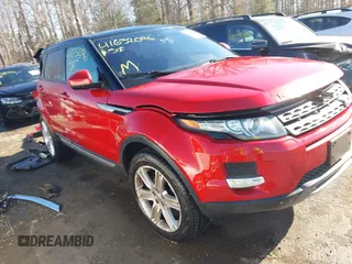 2015 Land Rover Range Rover Evoque Pure Plus z VIN SALVP2BG1FH020588, wystawiony jako IAAI lot #41632096 z przebiegiem 75 085 mil mil oraz . Historia ofert i sprzedaży dostępna na DreamBid. Obrazek 1.