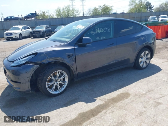 2022 Tesla Model Y Long Range with VIN 7SAYGDEE3NA007737, listed as a IAAI auction lot 42128359 with 42,597 mi miles and . Bid and sale history available at carsss.com. Image 2.