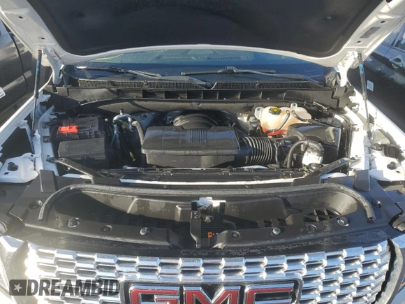 2022 GMC Yukon XL Denali with VIN 1GKS1JKL4NR132740, listed as a Copart auction lot 74690404 with 30,914 mi miles and Non Repairable. Bid and sale history available at DreamBid. Image 12.