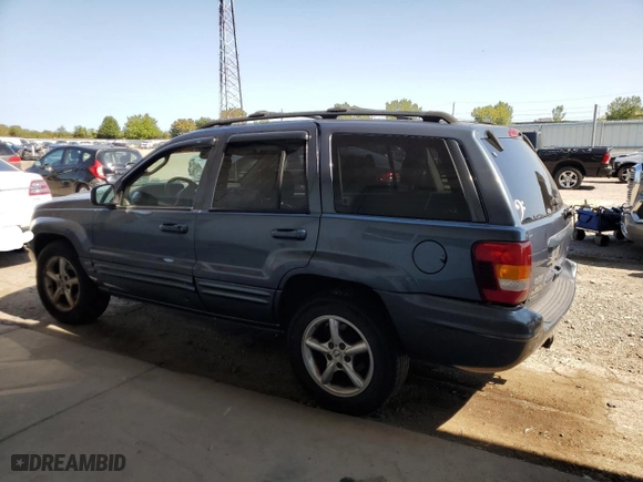 2003 Jeep Grand Cherokee Limited with VIN 1J8GW58N73C605929, listed as a Copart auction lot 70755024 with 173,147 mi miles and Salvage Title. Bid and sale history available at carsss.com. Image 2.