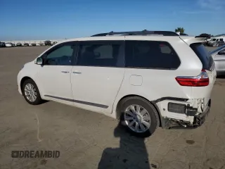 2015 Toyota Sienna Limited with VIN 5TDDK3DC2FS099332, listed as a Copart auction lot 47571435 with 107,449 mi miles and Salvage Title. Bid and sale history available at DreamBid. Image 2.