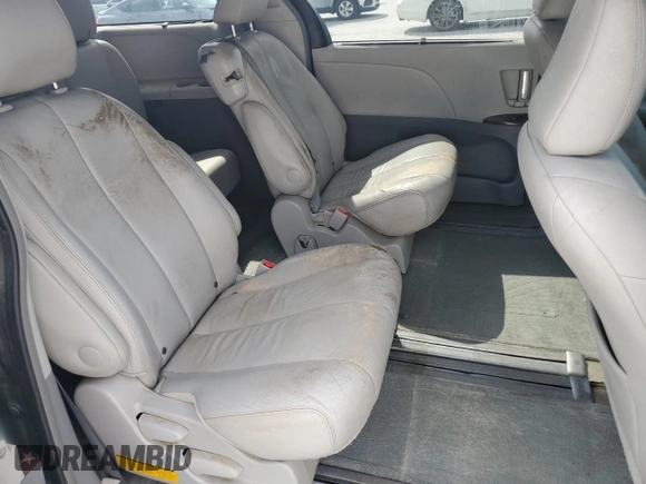 2014 Toyota Sienna XLE with VIN 5TDYK3DC2ES439353, listed as a Copart auction lot 54332275 with 130,312 mi miles and Salvage Title. Bid and sale history available at DreamBid. Image 11.