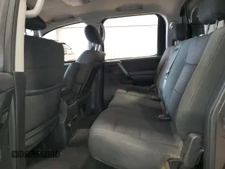 2010 Nissan Titan LE with VIN 1N6AA0EC2AN325657, listed as a Copart auction lot 88307625 with 147,010 mi miles and Salvage Title. Bid and sale history available at carsss.com. Image 10.