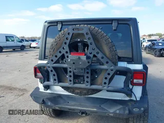 2018 Jeep Wrangler Unlimited Sport S с VIN 1C4HJXDG0JW205803, выставлен на аукционе IAAI как лот 41615097 с пробегом Не указан миль и . История ставок и продаж доступна на DreamBid. Изображение 16.