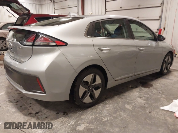 2021 Hyundai Ioniq Limited z VIN KMHC05LCXMU248623, wystawiony jako IAAI lot #41048763 z przebiegiem 101 905 mil mil oraz . Historia ofert i sprzedaży dostępna na DreamBid. Obrazek 4.