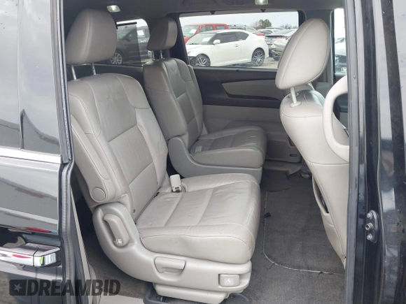 2012 Honda Odyssey Touring with VIN 5FNRL5H96CB058828, listed as a IAAI auction lot 41731389 with 152,295 mi miles and . Bid and sale history available at DreamBid. Image 8.