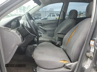 2004 Ford Focus ZX5 z VIN 3FAHP37324R110690, wystawiony jako Copart lot #49965085 z przebiegiem 178 749 mil mil oraz Tytuł czysty. Historia ofert i sprzedaży dostępna na DreamBid. Obrazek 7.