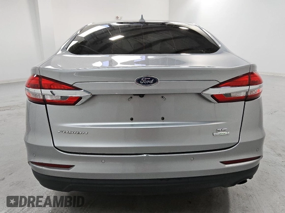 2020 Ford Fusion SE с VIN 3FA6P0HD0LR216857, выставлен на аукционе Copart как лот 60656415 с пробегом 92 016 миль миль и Чистый • Clean title. История ставок и продаж доступна на DreamBid. Изображение 6.