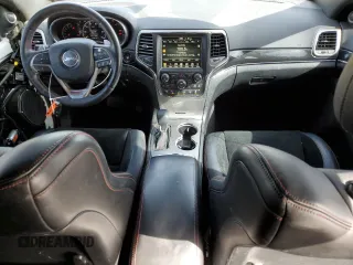 2017 Jeep Grand Cherokee Trailhawk with VIN 1C4RJFLT1HC729163, listed as a Copart auction lot 51115745 with 213,292 mi miles and Salvage title. Bid and sale history available at DreamBid. Image 8.