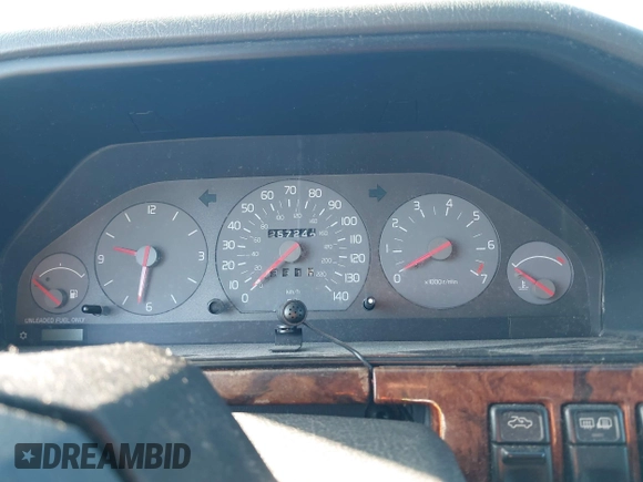 1998 Volvo S90 with VIN YV1KS9605W1129198, listed as a IAAI auction lot 42153215 with 257,242 mi miles. Bid and sale history available at carsss.com. Image 7.