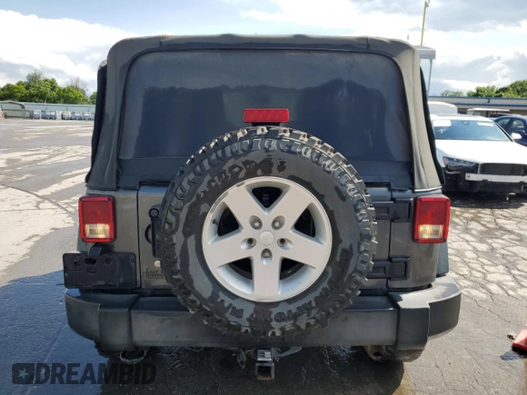 2017 Jeep Wrangler Willys Wheeler with VIN 1C4AJWAG2HL527192, listed as a Copart auction lot 58169245 with 88,737 mi miles and Salvage title. Bid and sale history available at DreamBid. Image 6.