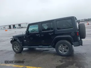2013 Jeep Wrangler Unlimited Sport z VIN 1C4BJWDGXDL596450, wystawiony jako IAAI lot #42323862 z przebiegiem 114 105 mil mil oraz . Historia ofert i sprzedaży dostępna na DreamBid. Obrazek 15.