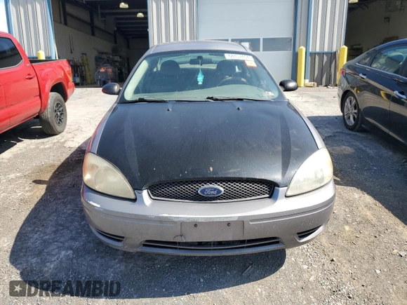 2006 Ford Taurus SE with VIN 1FAFP53U36A262525, listed as a Copart auction lot 86797374 with 179,508 mi miles and Salvage title. Bid and sale history available at DreamBid. Image 5.