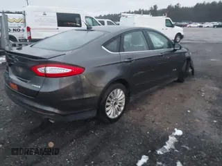 2015 Ford Fusion S Hybrid with VIN 3FA6P0UU2FR102241, listed as a IAAI auction lot 41003479 with 88,020 mi miles. Bid and sale history available at carsss.com. Image 4.