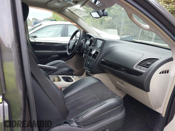 2014 Chrysler Town & Country Touring L with VIN 2C4RC1CG6ER195502, listed as a IAAI auction lot 42009629 with 126,157 mi miles and . Bid and sale history available at DreamBid. Image 5.