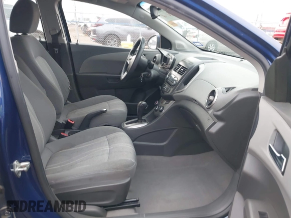 2013 Chevrolet Sonic LT with VIN 1G1JC5SH9D4160364, listed as a IAAI auction lot 42063359 with 111,222 mi miles and . Bid and sale history available at DreamBid. Image 5.