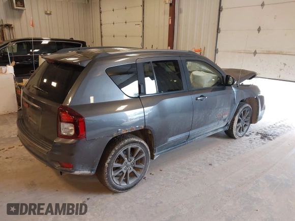 2016 Jeep Compass Sport with VIN 1C4NJDBB3GD805857, listed as a IAAI auction lot 42330519 with 135,578 mi miles and . Bid and sale history available at DreamBid. Image 4.
