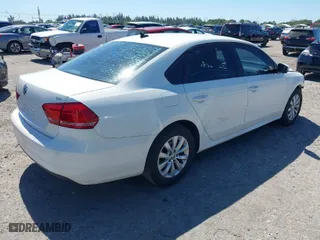 2015 Volkswagen Passat 1.8T S with VIN 1VWAT7A35FC038826, listed as a IAAI auction lot 41742799 with 123,468 mi miles. Bid and sale history available at carsss.com. Image 4.