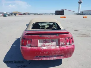 1999 Ford Mustang with VIN 1FAFP4445XF193138, listed as a IAAI auction lot 41716629 with 124,477 mi miles and . Bid and sale history available at DreamBid. Image 6.