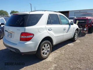 2006 Mercedes-Benz M 350 with VIN 4JGBB86E36A013232, listed as a IAAI auction lot 41964199 with 210,379 mi miles and . Bid and sale history available at DreamBid. Image 4.
