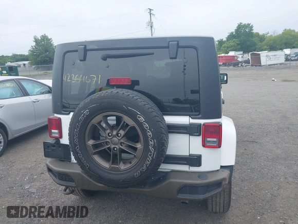 2017 Jeep Wrangler Unlimited 75th Anniversary z VIN 1C4HJWEG8HL502984, wystawiony jako IAAI lot #42354671 z przebiegiem 108 900 mil mil oraz . Historia ofert i sprzedaży dostępna na DreamBid. Obrazek 16.