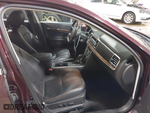 2012 Lincoln MKZ with VIN 3LNHL2JC3CR823939, listed as a IAAI auction lot 41816572 with 156,507 mi miles. Bid and sale history available at carsss.com. Image 5.